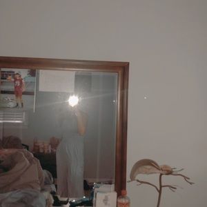 Blue and white striped smocked romper